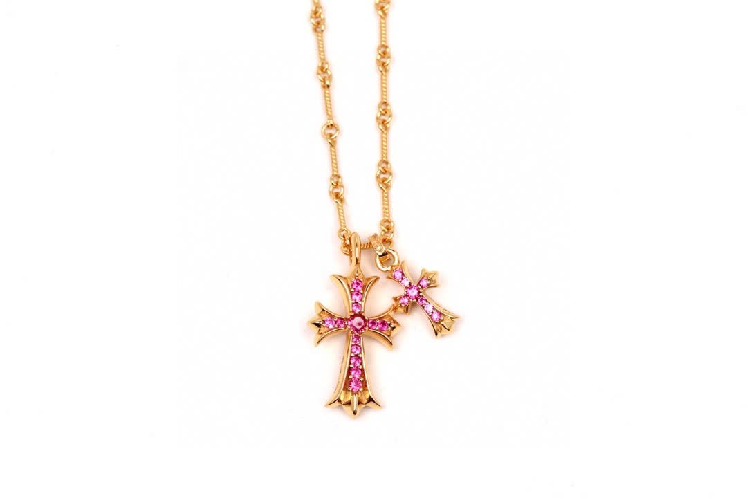 Chrome Hearts Gold Cross Pendant with Pink Stones